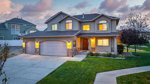 View of front facade featuring a yard