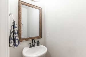 Bathroom with sink and toilet