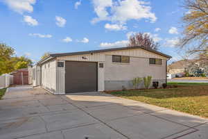 Exterior space featuring a front yard