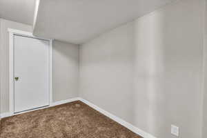 Unfurnished bedroom featuring carpet