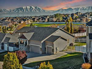 Aerial view at dusk featuring a mountain view