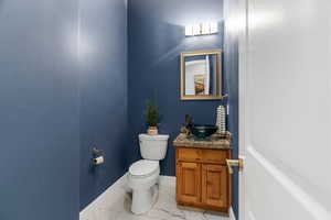 Bathroom featuring toilet and vanity