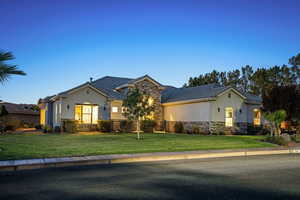 View of front of home featuring a front lawn