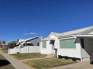 View of home's exterior featuring a yard