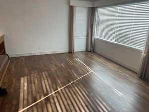 Front room featuring dark hardwood / wood-style flooring