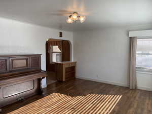 Front room featuring dark hardwood / wood-style flooring