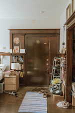 Interior space with dark hardwood / wood-style flooring