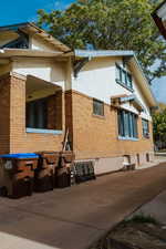 View of side of property with a patio area