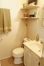 Bathroom with vanity and toilet