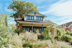 View of front of property featuring a porch