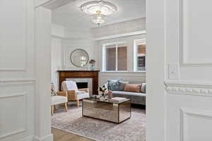 Crown molding, Wainscoting, Crystal Chandelier, Medallion, Fireplace