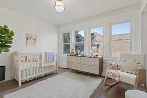 Bedroom with a nursery area, lots of natural lighting