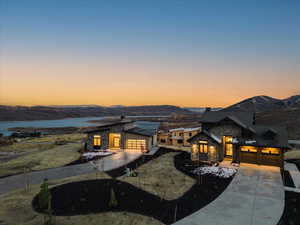 Exterior space with a garage and a mountain view