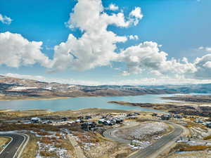 Bird's eye view featuring a water and mountain view