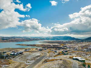 Aerial view with a water and mountain view