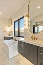 Bathroom with a mountain view and vanity