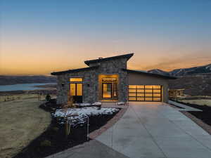 View of front of home with a garage