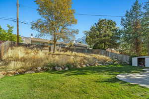 View of yard with an outdoor structure