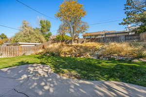 View of yard with a patio