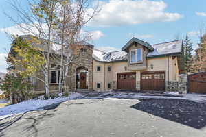 View of front of property featuring a garage