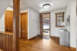 Foyer entrance featuring hardwood / wood-style flooring