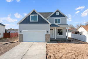 View of front of property featuring a garage