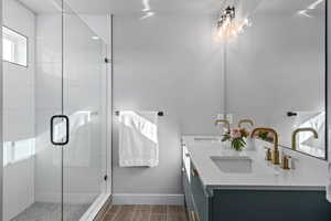 Master Bathroom with vanity and spacious shower