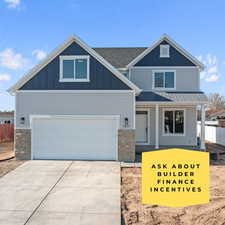 View of front of home featuring stone siding, a porch, board and batten siding, and concrete driveway