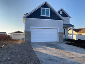 Craftsman-style house with a garage