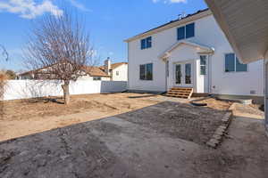 Rear view of house with a patio