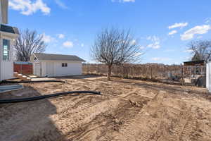 View of yard featuring detached garage