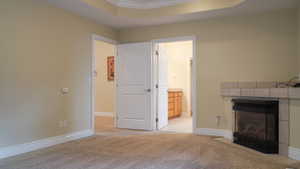 Master Bedroom with carpet, ceiling fan, and a gas insert fireplace