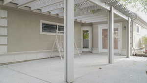 View of patio featuring a pergola