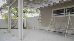 View of patio featuring a pergola