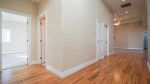 Entry/Hallway with medium hardwood floors