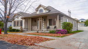 Bungalow-style house with a porch