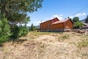 View of yard with a mountain view