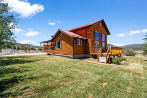 View of home's exterior featuring a lawn