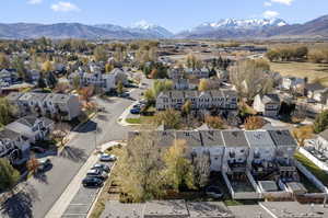 Birds eye view of property with a mountain view