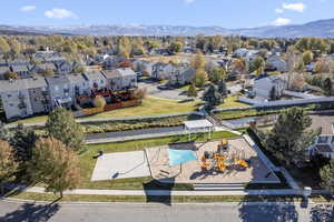 Birds eye view of property featuring a mountain view