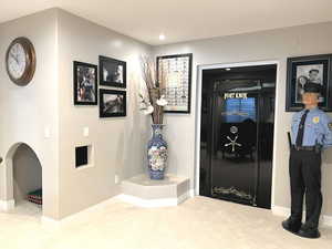 Foyer entrance with light carpet