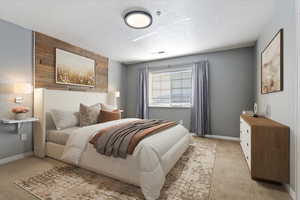 FURNISHED Main Bedroom featuring wood walls, baseboards, a textured ceiling, and light colored carpet