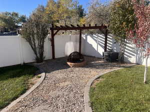 View of yard featuring a fire pit