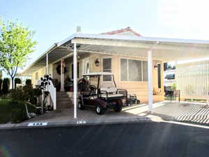 Exterior of home featuring a carport