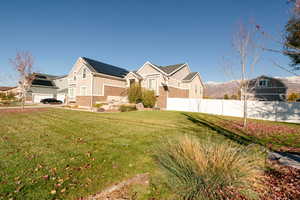 View of front of home with a front yard