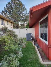 View of yard featuring central air condition unit