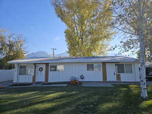 View of front of home with a front yard