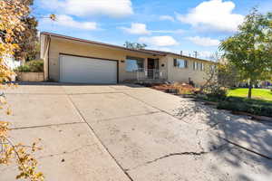 Single story home with a garage