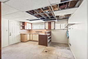 Kitchen with a paneled ceiling