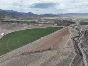 Birds eye view of property with a mountain view and a rural view